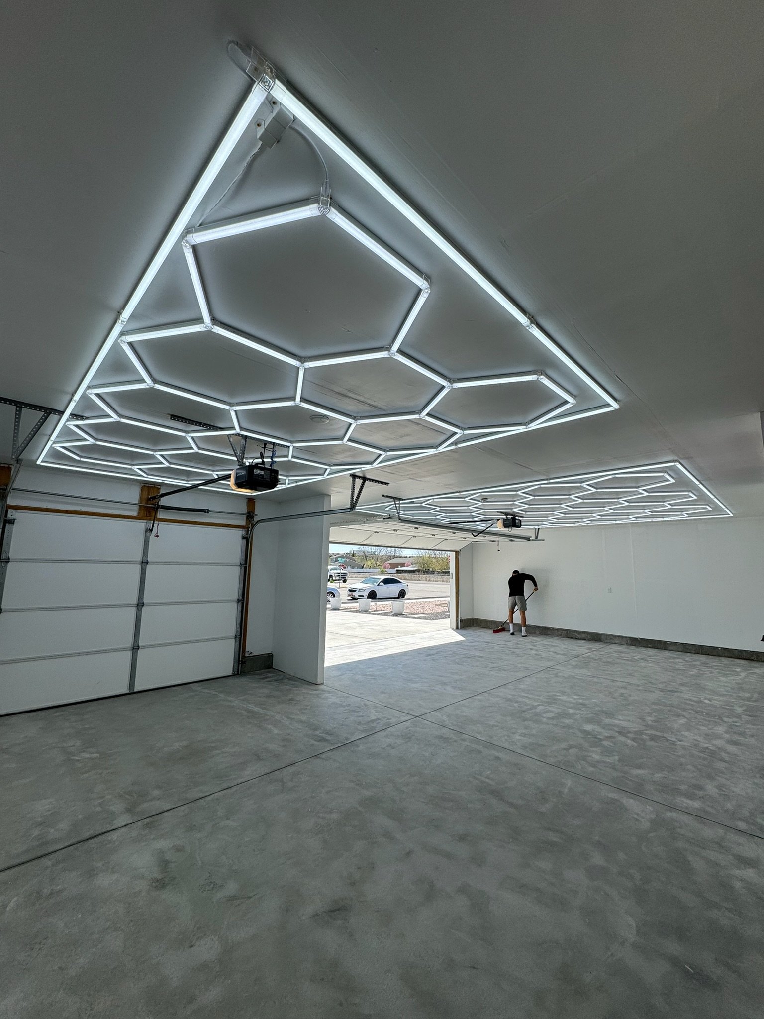 Two-car garage with custom hex ceiling lighting